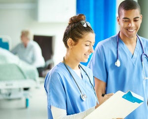 Medical staff looking over charts