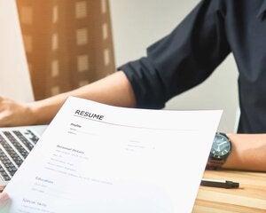 Young woman submit resume to employer to review job application