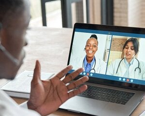 Multicultural doctors team conferencing in video call chat discussing health care learning online during web seminar.
