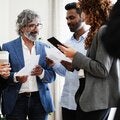 Group of business people networking at an event