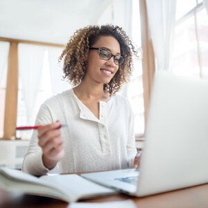 woman sitting at computer