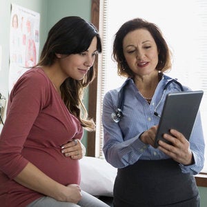 Physician and pregnant woman