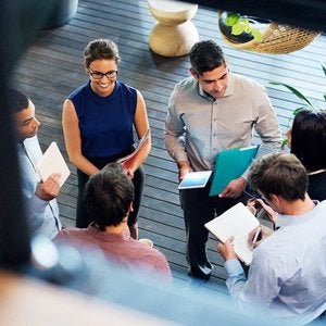 project managers standing in circle