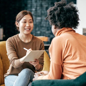 woman talking with another woman