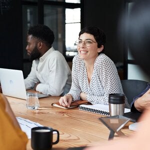 smiling businesswoman meeting in the workplace