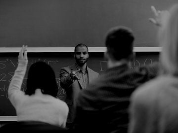 male teacher in classroom