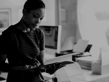 woman looking at paperwork