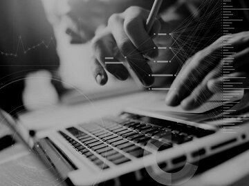 Man typing on keyboard