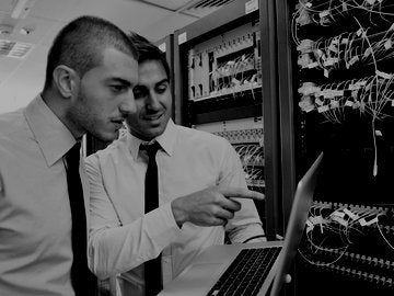 two men in computer server room