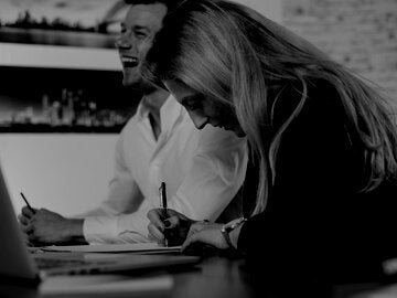 People writing ideas in a writers room