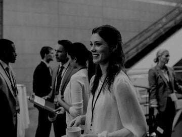 Business people networking at conference