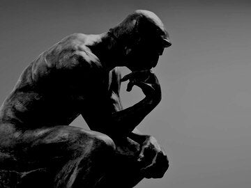 The Thinker statue by Rodin