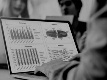 business team working on spreadsheets