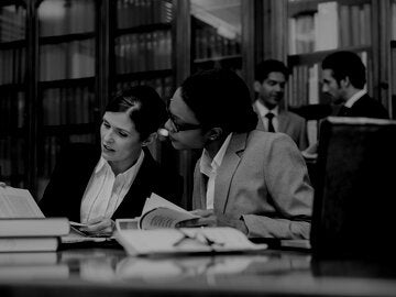 women discussing the case