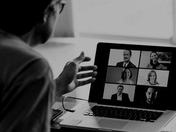 A business colleague working together through internet live streaming, video conferencing