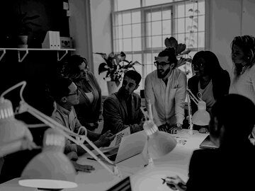 Group of business professionals around a table