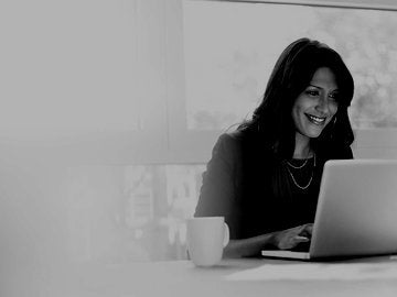 Young business woman working on a laptop