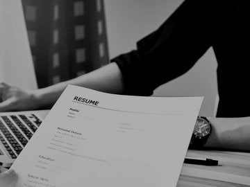 Young woman submit resume to employer to review job application