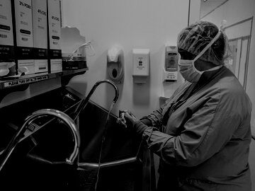 Healthcare worker washing hands