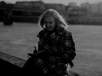 Senior woman writing