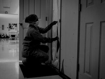 Nurse quarantining a room