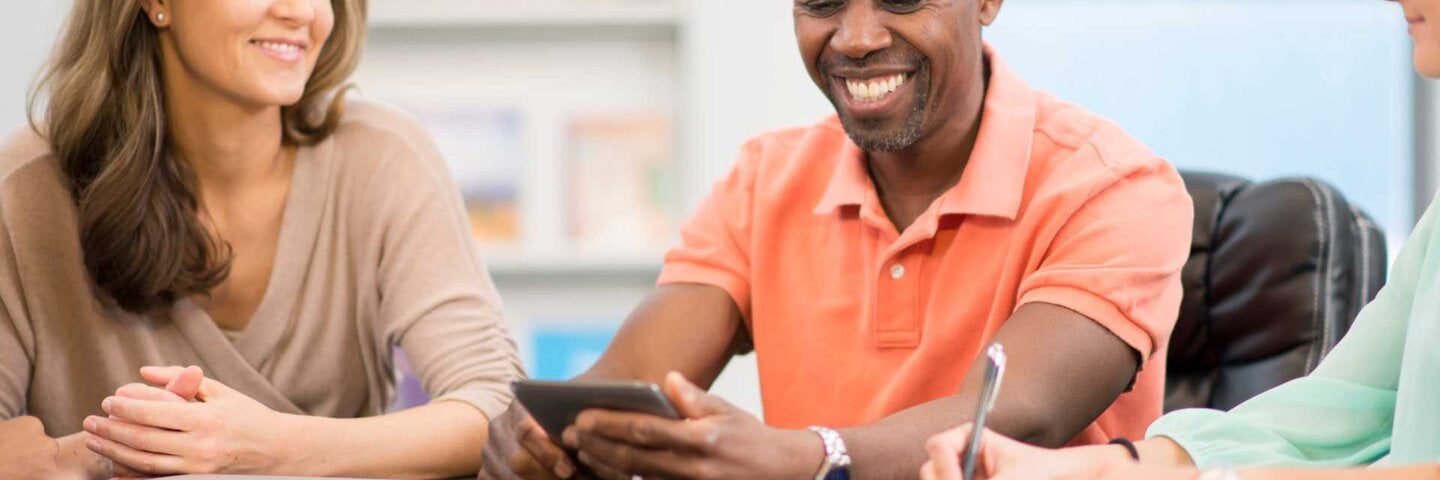 business professionals around a conference table