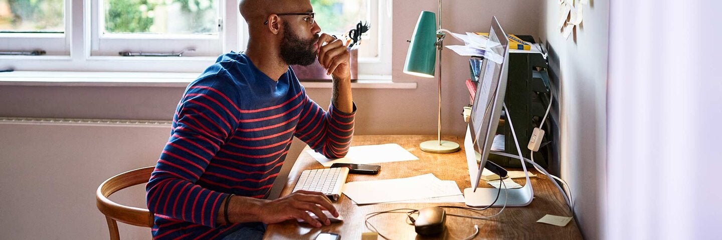 Man working at home on computer