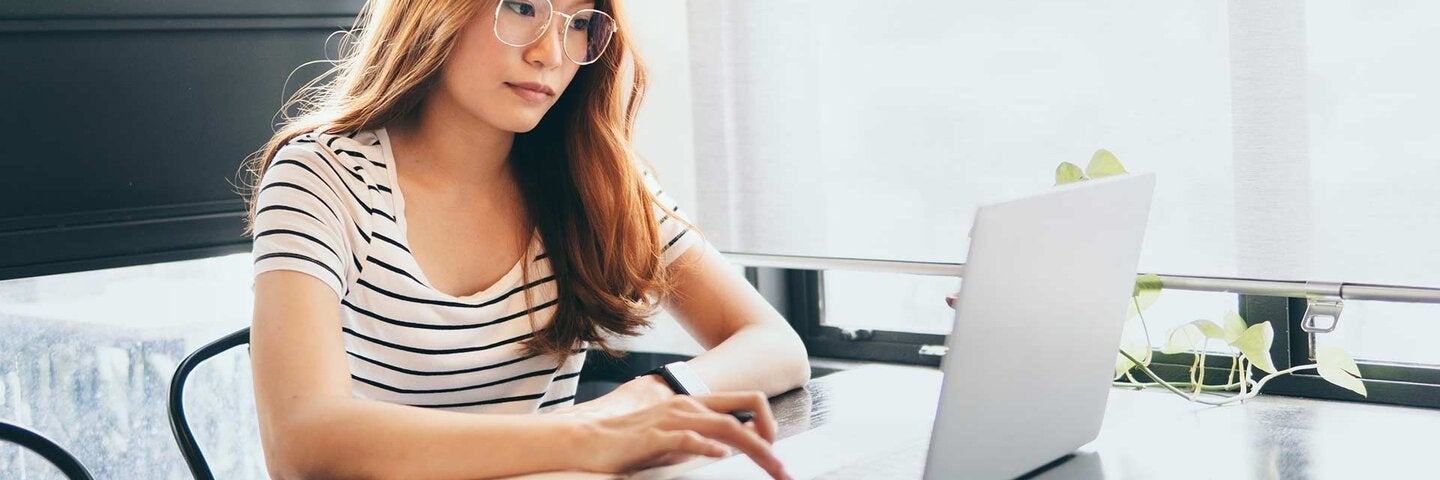 woman using laptop computer