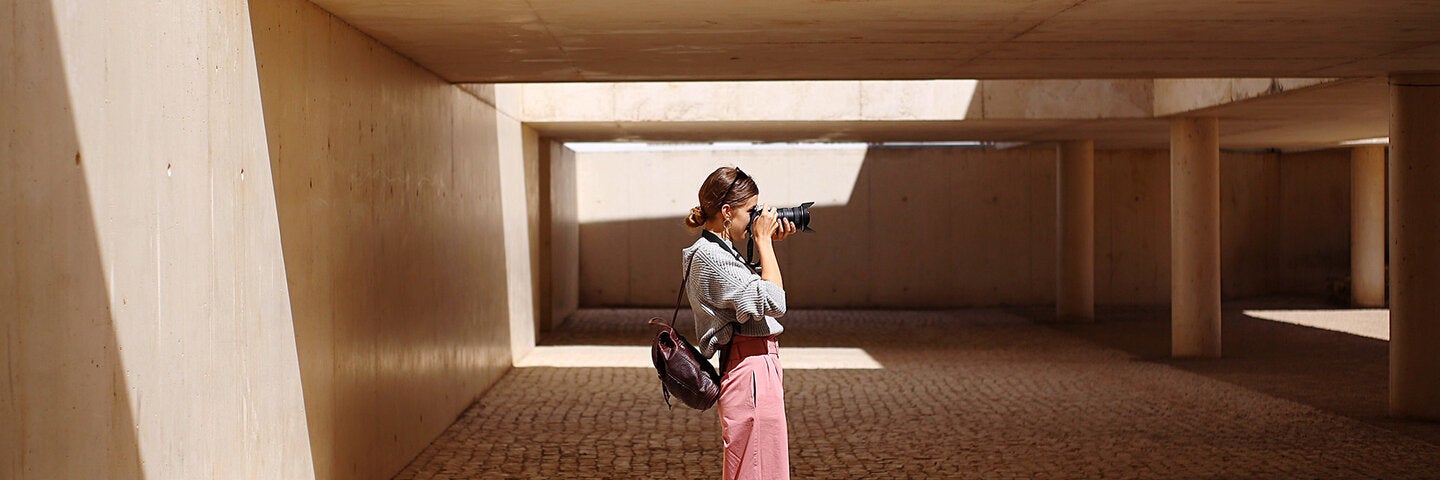 Photographer taking a photo of architecture