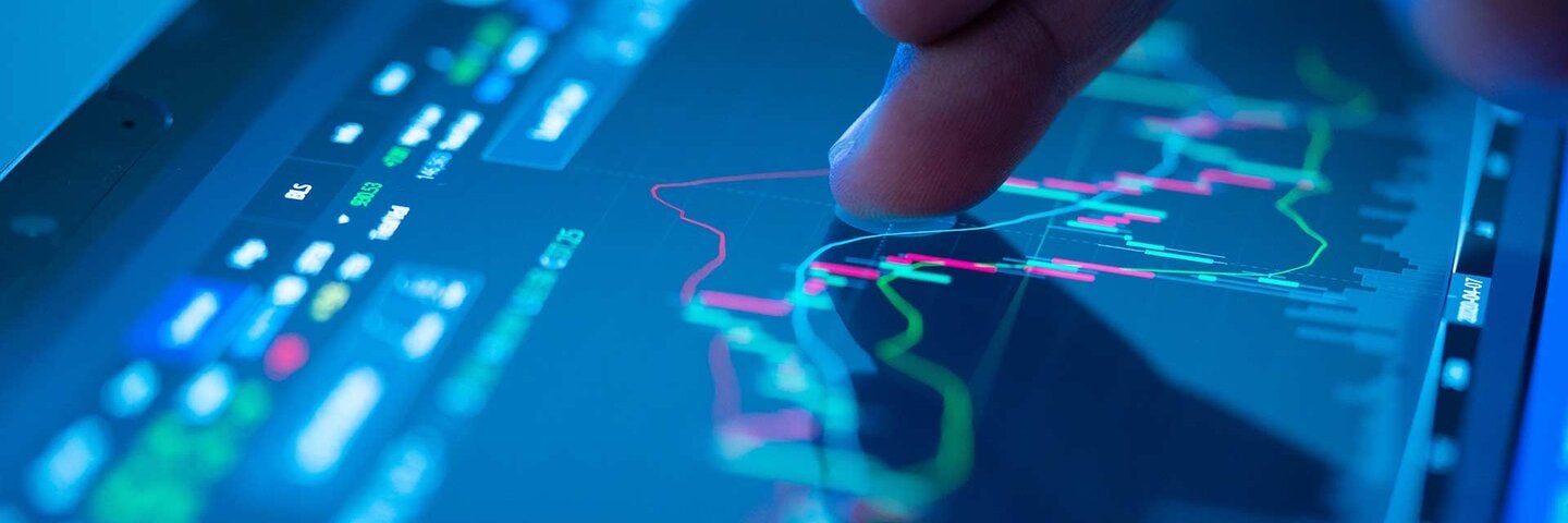 Businessman checking stock market data