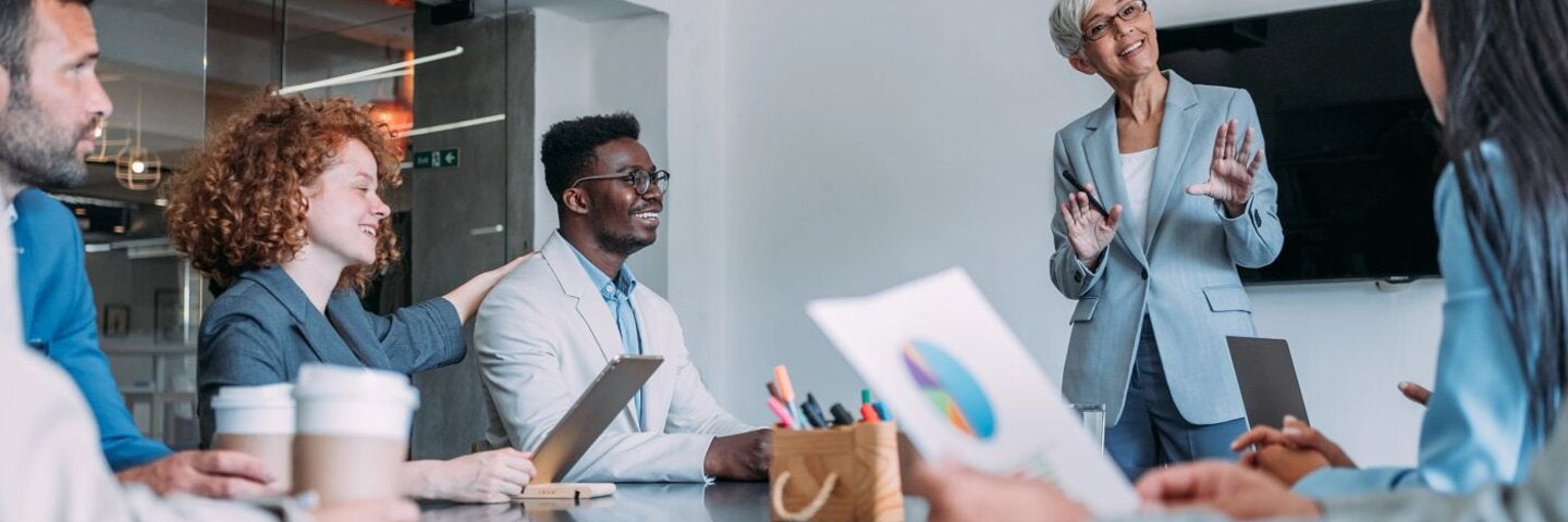 Team of happy professionals during a meeting.