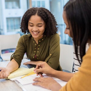 Woman counseling a student