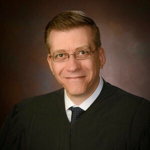 Judge Emin Toro