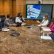 Doctor meeting on infection control in a board room