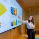 Woman giving a business analysis presentation